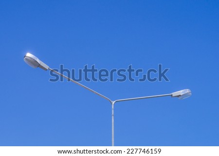 Light Pole with Blue Sky in Background