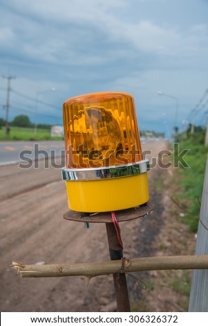 Emergency light on road of construction site