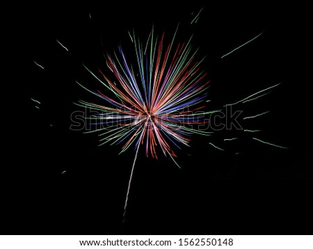 A firework going off at a bonfire night party Photo stock © 