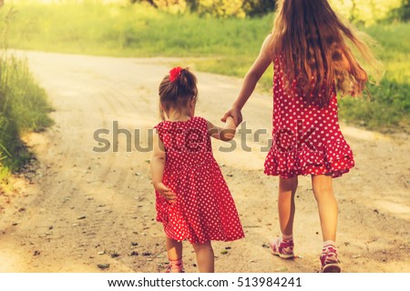 Free Photos Two Sisters Holding Hands On A Summers Day Avopix.com - 450x320 - jpeg Two Sisters Holding Hands