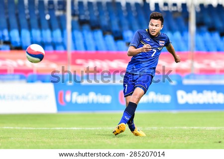 BISHAN,SINGAPORE-JUNE4: Thitipan Puangchan of Thailand in action during the 28th SEA Games Singapore 2015 match between Thailand and Malaysia at Bishan Stadium on JUNE4 2015 in,SINGAPORE