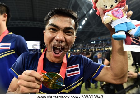 Kallang,Singapore - JUNE 15: Songkrasin celebrates winning the gold medal. 28th SEA Games Singapore 2015  at Singapore National Stadium on JUNE15 2015