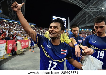 Kallang,Singapore - JUNE 15:Nurul Sriyankem thank fans and celebrates winning the gold medal. 28th SEA Games Singapore 2015 at Singapore National Stadium on JUNE15 2015