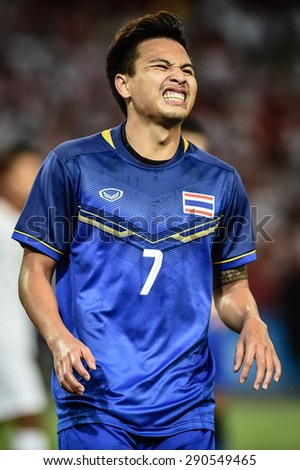 Kallang,Singapore - JUNE 15:Thitipan Puangchan of Thailand in action during the 28th SEA Games Singapore 2015 match between Thailand and Myanmar at Singapore National Stadium on JUNE15 2015