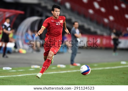 Kallang,Singapore JUNE15:NGUYEN Thanh Hien of Vietnam in action during the 28th SEA Games Singapore 2015 match between Vietnam and Indonesia at Singapore National Stadium on JUNE15 2015