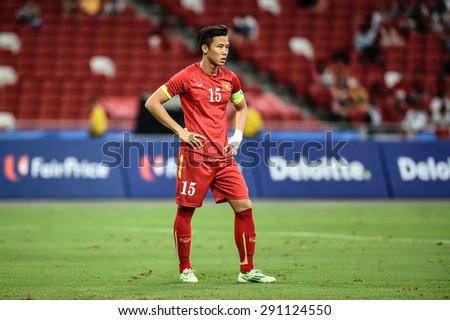 Kallang,Singapore JUNE15:QUE Ngoc Hai of Vietnam in action during the 28th SEA Games Singapore 2015 match between Vietnam and Indonesia at Singapore National Stadium on JUNE15 2015