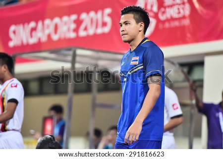 BISHAN,SINGAPORE-JUNE6:Thitipan Puangchan of Thailand in action during the 28th SEA Games Singapore 2015 match between Thailand and Brunei at Bishan Stadium on JUNE6 2015 in,SINGAPORE