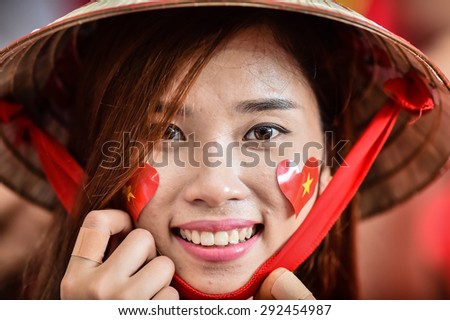 Kallang,Singapore - JUNE 13:Unidentified fan of Vietnam national supporters during the 28th SEA Games Singapore 2015 match between Vietnam and Myanmar at Singapore National Stadium on JUNE13 2015
