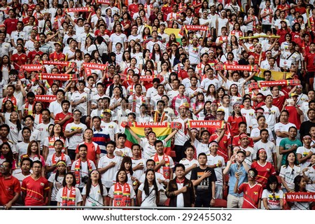 Kallang,Singapore - JUNE 13:Unidentified fans of Myanmar national supporters during the 28th SEA Games Singapore 2015 match between Myanmar and Vietnam at Singapore National Stadium on JUNE13 2015