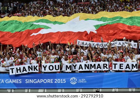 Kallang,Singapore - JUNE 15:Unidentified fan of Myanmar national supporters during the 28th SEA Games Singapore 2015 match between Myanmar and Thailand at Singapore National Stadium on JUNE15 2015