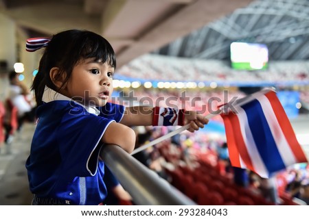 Kallang,Singapore - JUNE 13:Unidentified fan of Thailand national supporters during the 28th SEA Games Singapore 2015 match between Thailand and Indonesia at Singapore National Stadium on JUNE13 2015