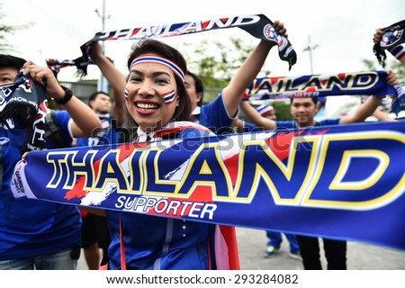 Kallang,Singapore - JUNE 13:Unidentified fans of Thailand national supporters during the 28th SEA Games Singapore 2015 match between Thailand and Indonesia at Singapore National Stadium on JUNE13 2015