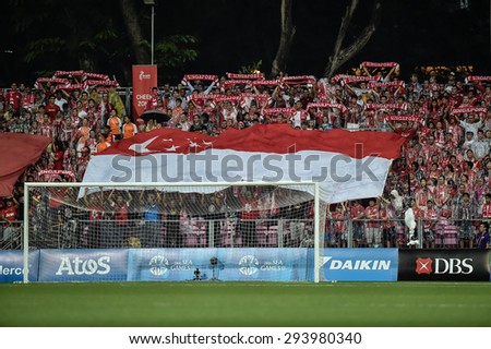KALLANG,SINGAPORE-JUNE11:Unidentified fans of Singapore national supporters during 28th SEA Games Singapore2015 match between Singapore and Indonesia at JalanBesar Stadium on JUNE11 2015 in,SINGAPORE.