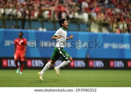 KALLANG,SINGAPORE-JUNE11:DARMONO Evan Dimas of Indonesia in action during the 28th SEA Games Singapore 2015 match between Indonisia and Singapore at Jalan Besar Stadium on JUNE11 2015 in,SINGAPORE.