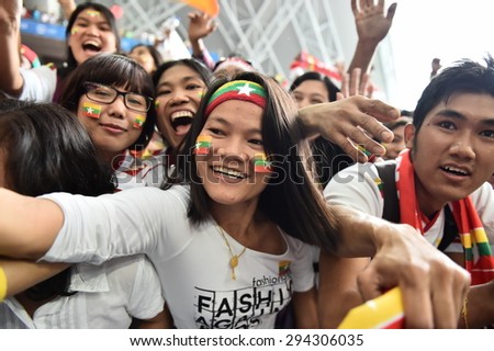Kallang,Singapore - JUNE 13:Unidentified fan of Myanmar national supporters during the 28th SEA Games Singapore 2015 match between Myanmar and Vietnam at Singapore National Stadium on JUNE13 2015