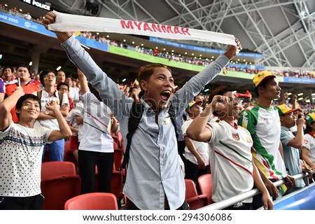 Kallang,Singapore - JUNE 13:Unidentified fan of Myanmar national supporters during the 28th SEA Games Singapore 2015 match between Myanmar and Vietnam at Singapore National Stadium on JUNE13 2015