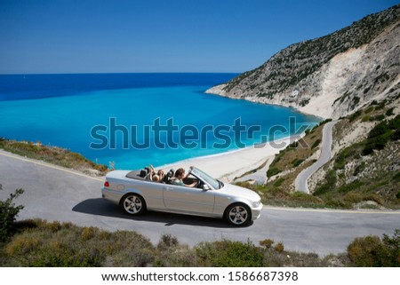 Similar – Image, Stock Photo Traveler driving car along road