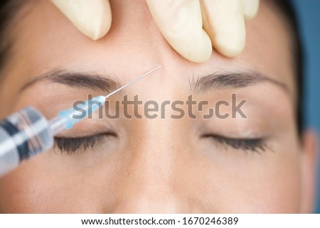 A young woman having injections