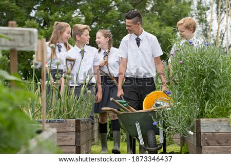 Similar – Foto Bild Schubkarre Bildung