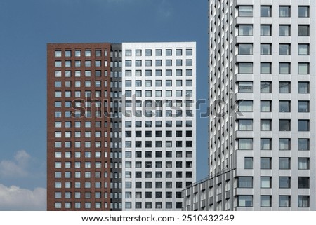 Similar – Image, Stock Photo two facades made of exposed concrete with task in profile