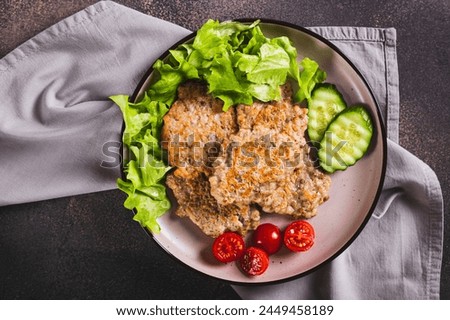 Similar – Image, Stock Photo Preparation of tasty buckwheat balls on kitchen table with ingredients. Healthy home cooking and eating concept