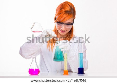 Student girl in the lab doing chemistry reactions - studio shoot