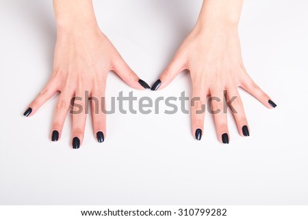 Black nail lacquer manicure - hands