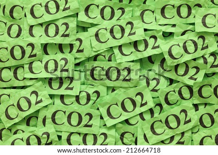 Pile of green paper notes with word \