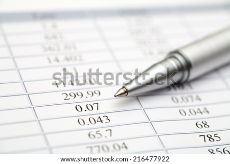Financial statements. Ballpoint pen on financial statements.