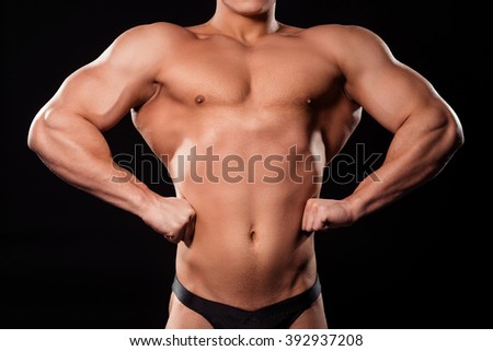 Bodybuilder's front lat spread pose. Close-up of front lat spread. Show us the lat width. The v-shaped torso. Stock fotó © 