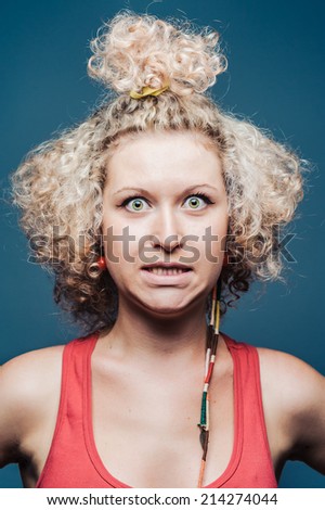 Blonde curly girl with facial expressions