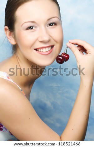 happy woman with cherries