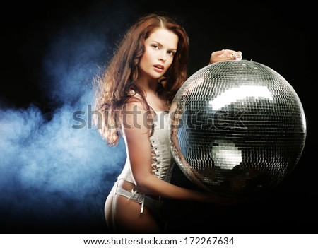 dancer girl in smoke with disco ball