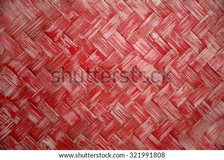 worn texture of the red herringbone wicker, shabby texture pink red wicker, wickerwork, netting