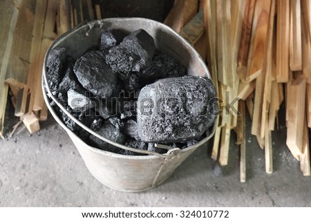 iron bucket of coal, fuel for the forge, energy resources