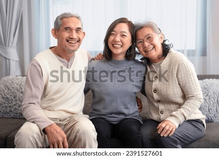 Similar – Image, Stock Photo Husband and daughter visiting senior woman in hospital