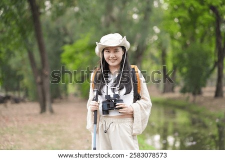 Similar – Image, Stock Photo Young female tourist posing near old cathedral. Neutral colors in clothes style. Beige color walls. Woman tourist wearing white t-shirt.