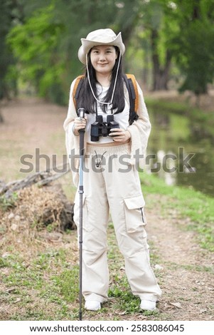 Similar – Image, Stock Photo Young female tourist posing near old cathedral. Neutral colors in clothes style. Beige color walls. Woman tourist wearing white t-shirt.