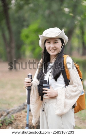 Similar – Image, Stock Photo Young female tourist posing near old cathedral. Neutral colors in clothes style. Beige color walls. Woman tourist wearing white t-shirt.