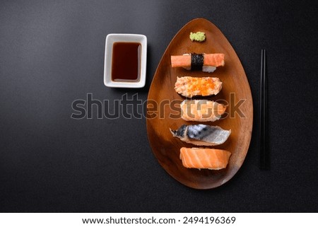 Similar – Image, Stock Photo Delicious Sushi Plates in Restaurant