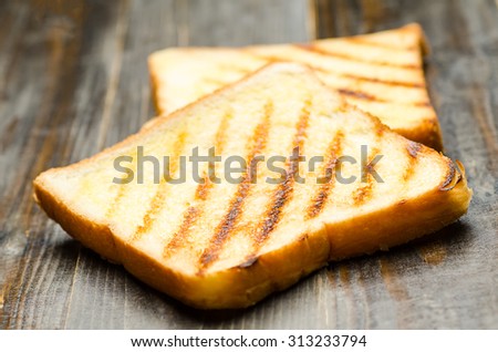 The toast on wooden background,breakfast or meal