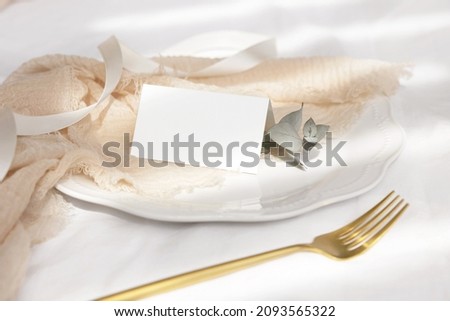 Similar – Image, Stock Photo Wedding Table place with a card over envelope near flowers and feathers, mockup