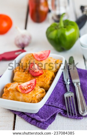 Stuffed cabbage rolls with minced meat and rice, dinner, on a white background