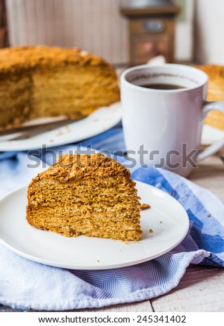 honey caramel cake with butter cream and nuts,dessert,Ukrainian cuisine