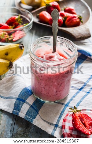 strawberry-banana frozen smoothies in a glass fruit dessert, summer, clean eating