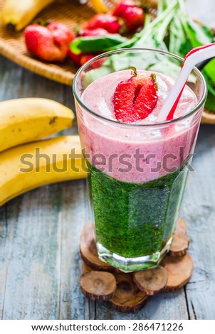 double smoothies, green with spinach, kiwi and banana with strawberries, healthy breakfast bright, clean eating