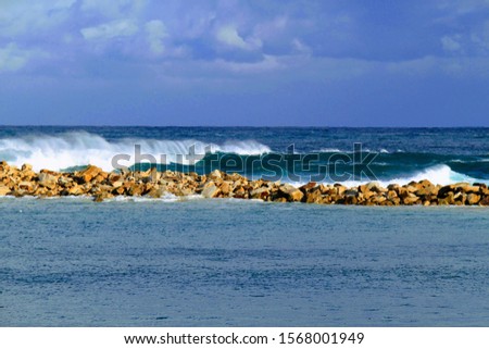 Waves at the Morsens Breakwall. Stockfoto © 