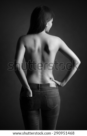 Woman standing back on black & white tone