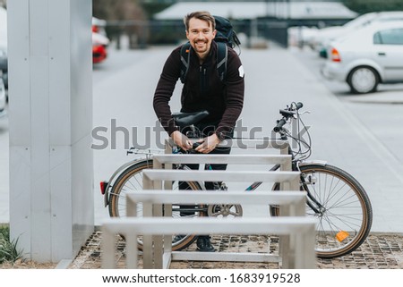 Similar – Foto Bild ein abgestelltes abgeschlossenes Fahrrad