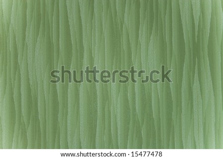 Closeup of green fabric (as an abstract grass or seaweed background)